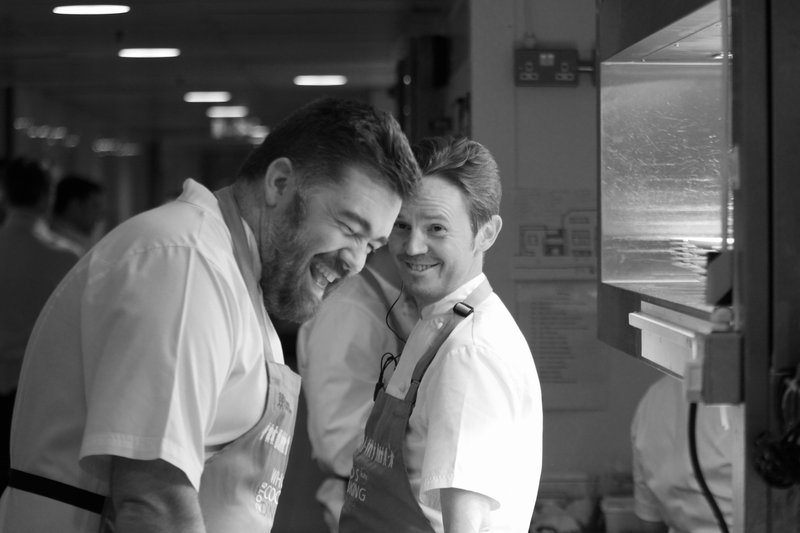 Nathan Outlaw laughing in the kitchen at Who's Cooking Dinner - a fundraising event for Leuka's leukaemia research