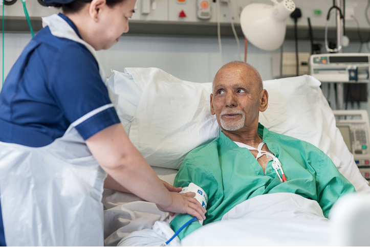 Leukaemia patient being cared for by nurse