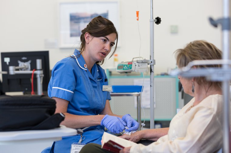 Nurse and patient with leukaemia - part of Leuka's leukaemia research and treatment